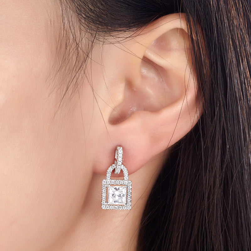 The Devotion Set - lock and key earrings model view