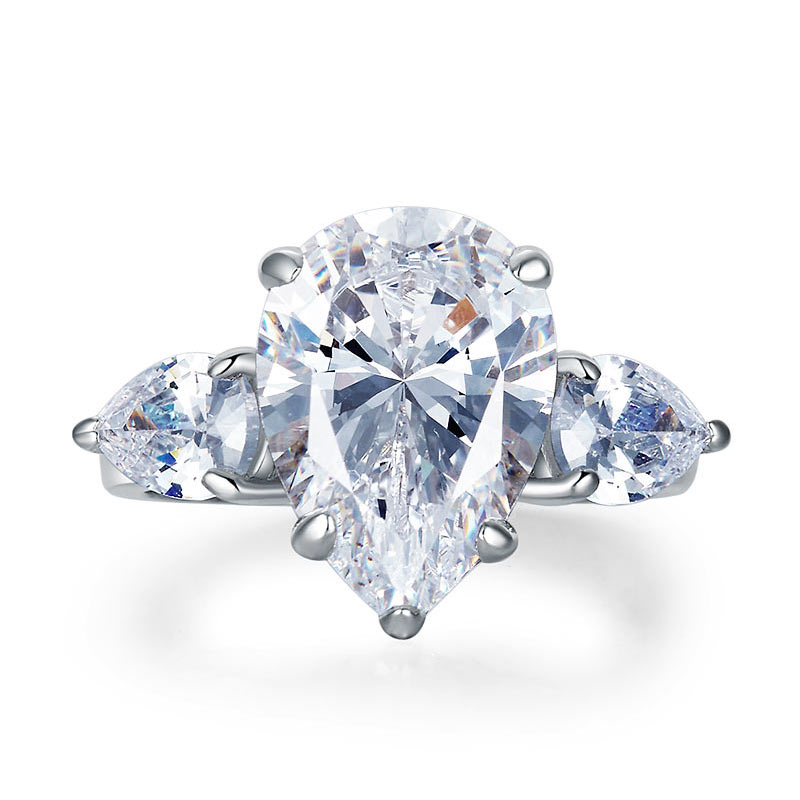 Pear Cut 4 Carat Three-Stone Luxury Ring - View 3 | SelinJewels