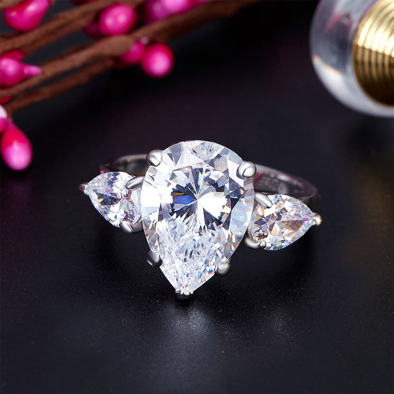 Pear Cut 4 Carat Three-Stone Luxury Ring - View 2 | SelinJewels
